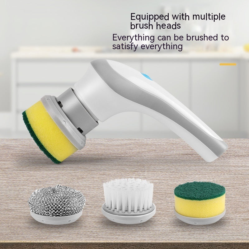 Wireless kitchen cleaning brush charging via USB.